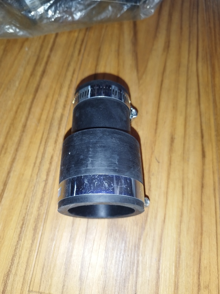 PM00582 - FLEXIBLE PVC RUBBER COUPLING w/ STAINLESS STEEL CLAMPS